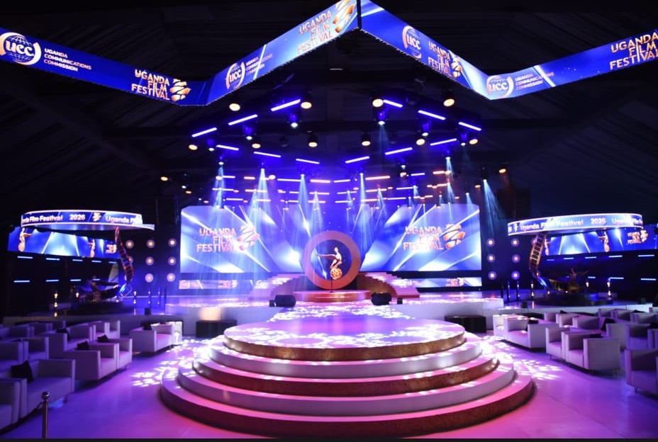 Uganda Film Festival main stage with blue lighting, LED screens and circular runway